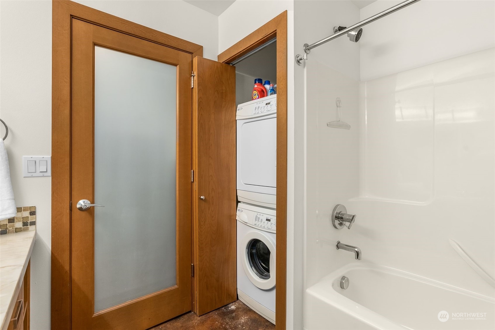 723 North 42nd Street Seattle, WA 98103 - Photo 10 of 27 a bathroom with a bathtub and a shower