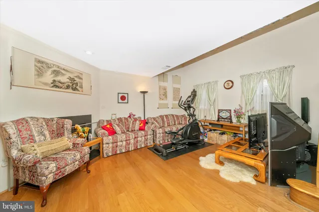 a view of a livingroom with furniture and toys