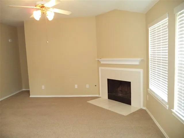 a view of a livingroom with a fireplace