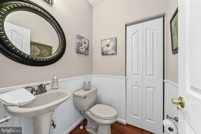 a bathroom with a toilet and a sink