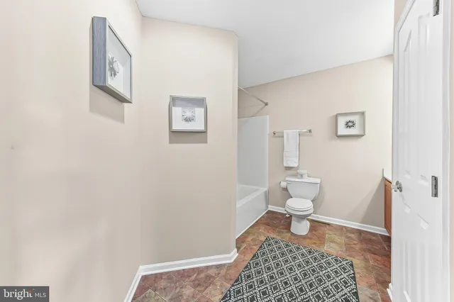 a bathroom with a toilet