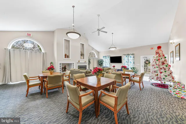 a room with gym equipment and windows