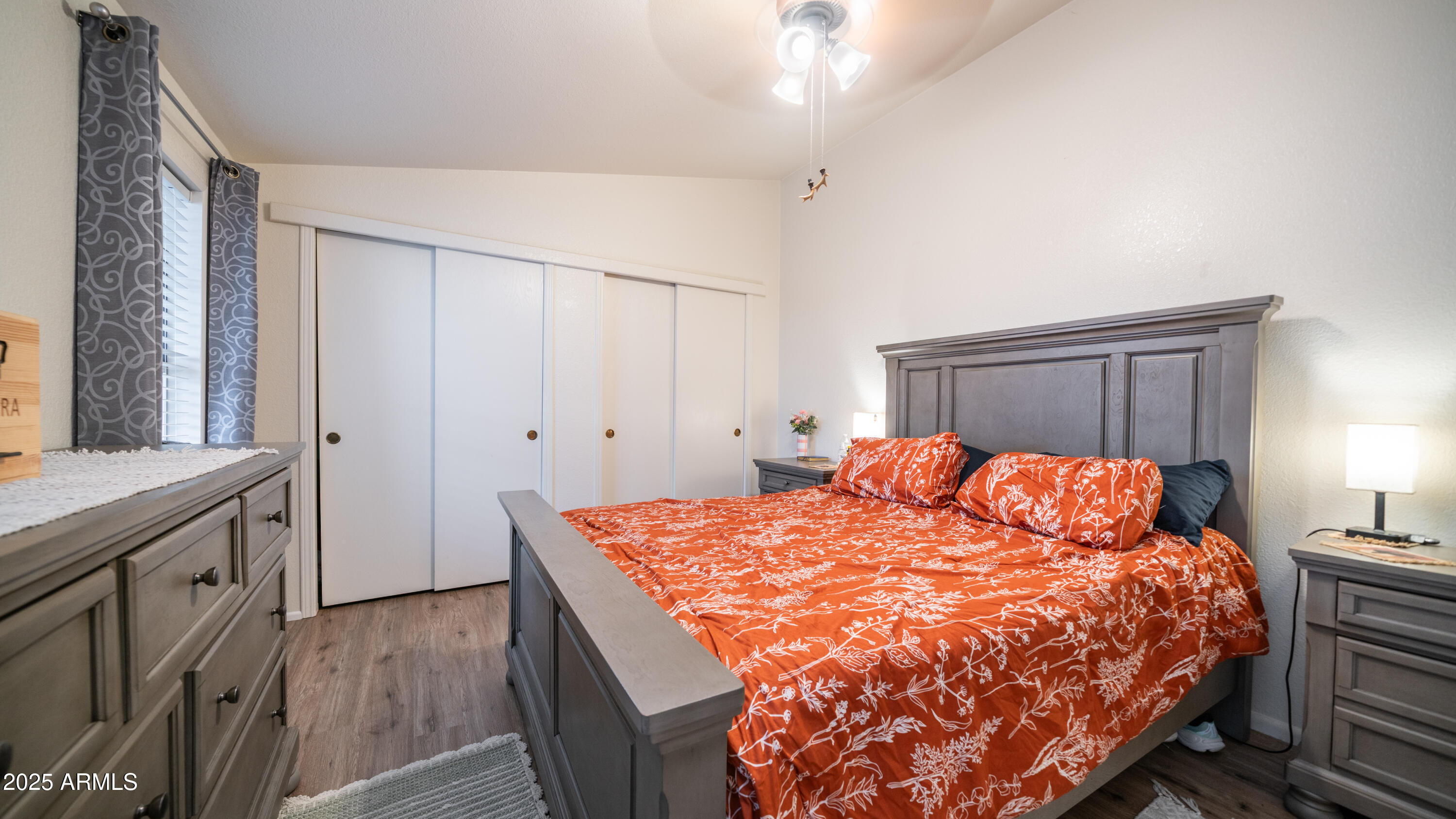 3355 South Cortez Road, Unit 98 Apache Junction, AZ 85119 - Photo 21 of 46 a bedroom with a bed and a dresser