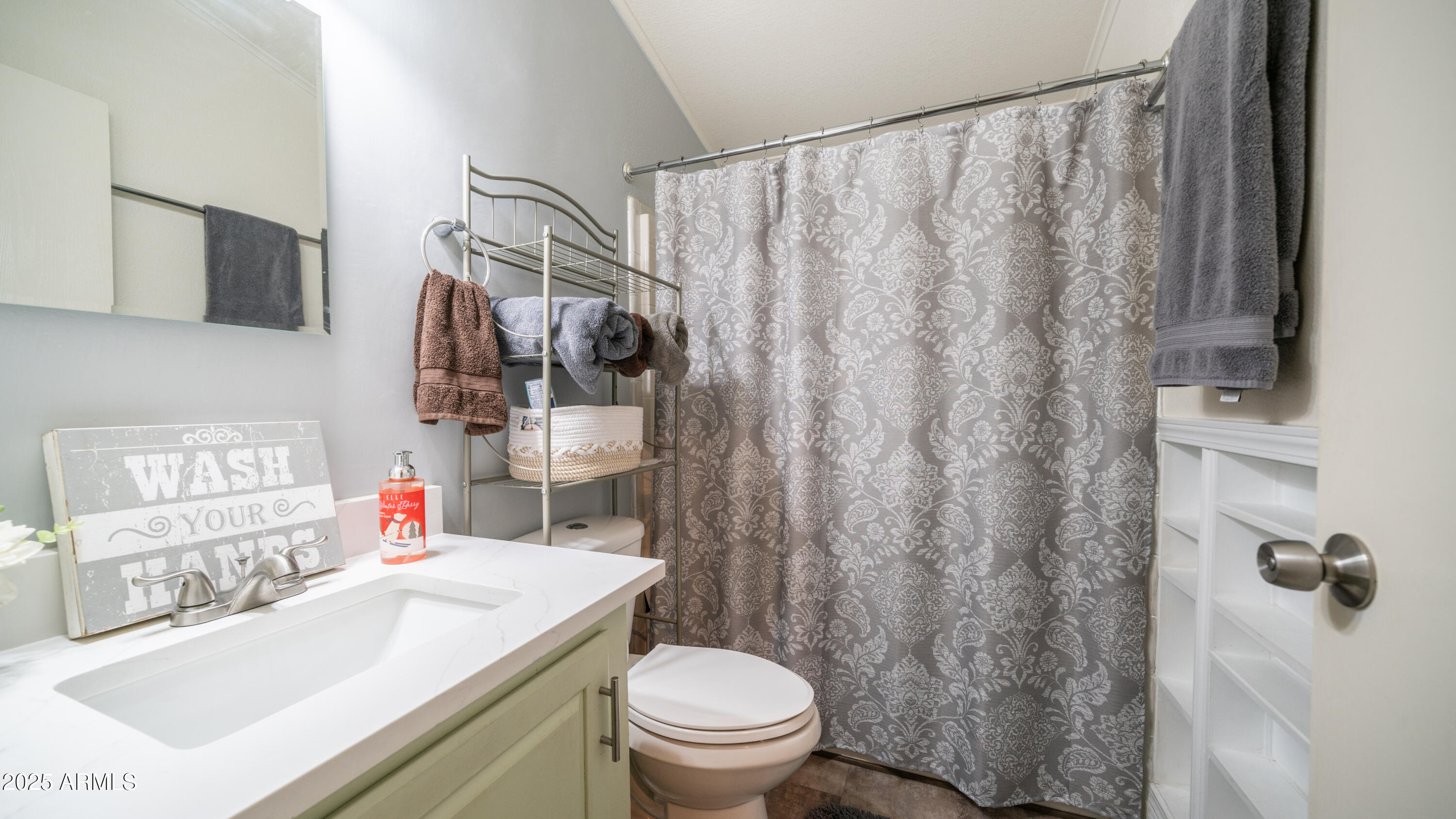 3355 South Cortez Road, Unit 98 Apache Junction, AZ 85119 - Photo 28 of 46 a bathroom with a sink toilet and shower