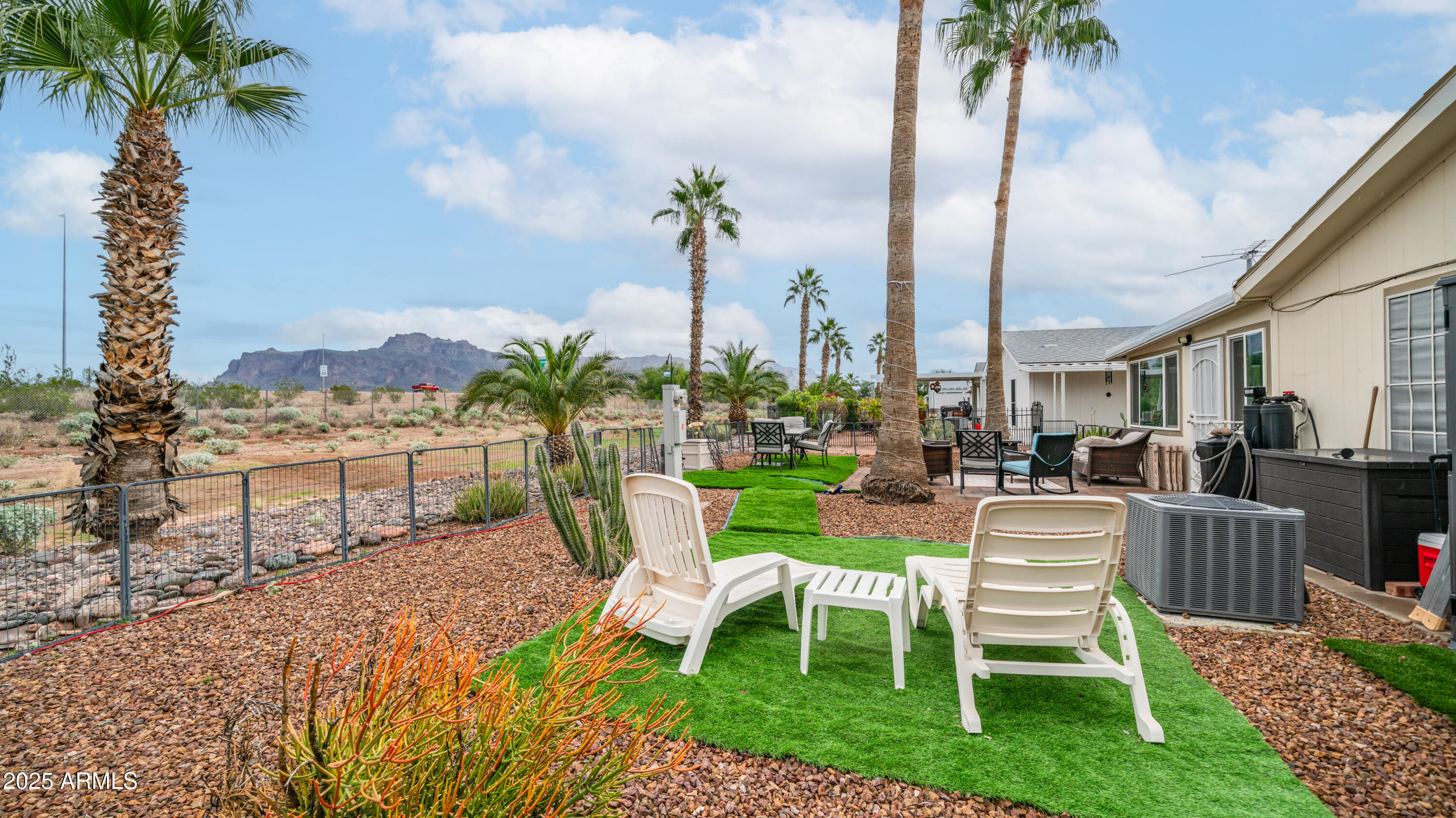 3355 South Cortez Road, Unit 98 Apache Junction, AZ 85119 - Photo 37 of 46 a view of a chairs and table in patio