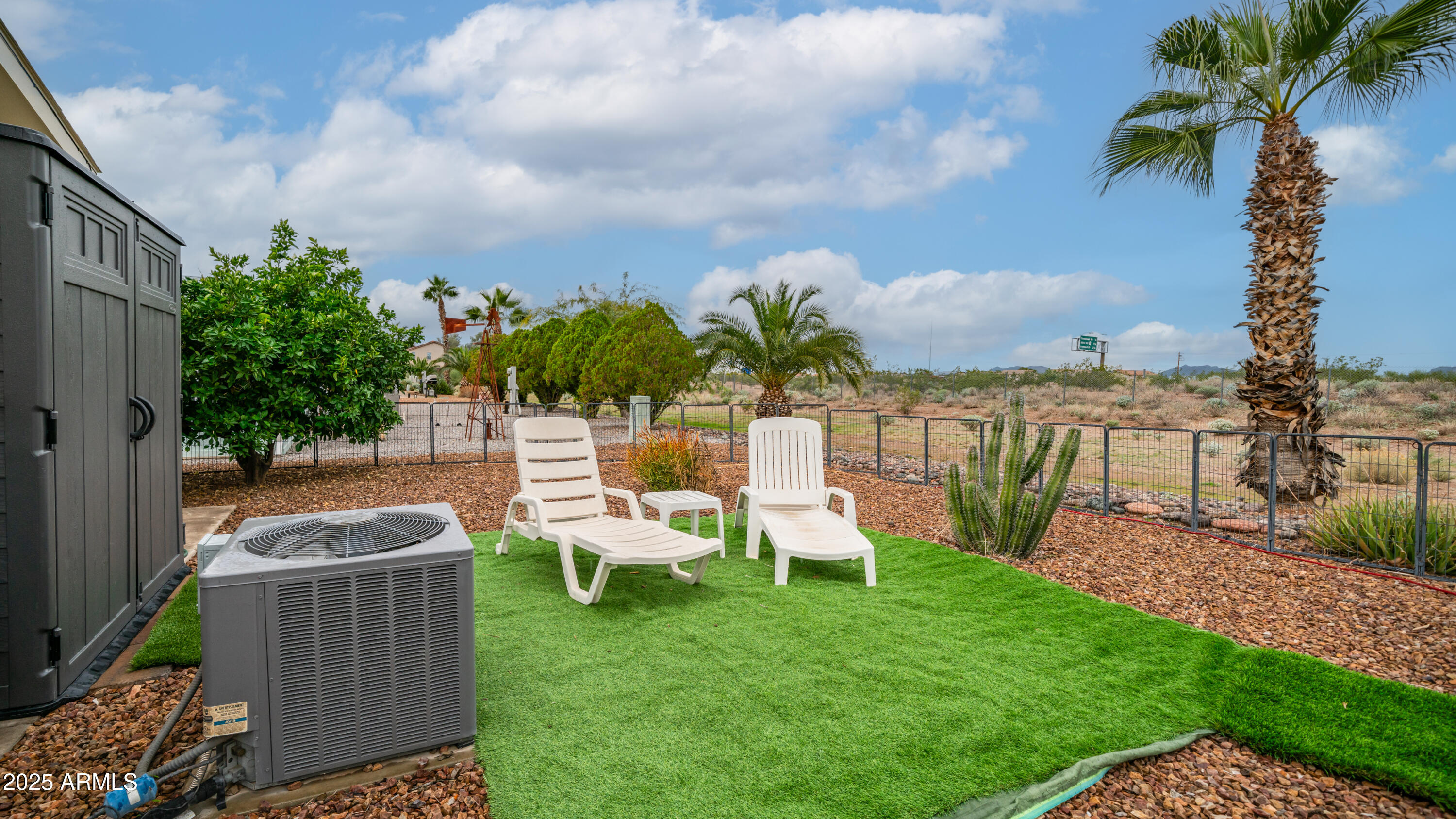 3355 South Cortez Road, Unit 98 Apache Junction, AZ 85119 - Photo 43 of 46 a view of a sitting area with furniture and garden