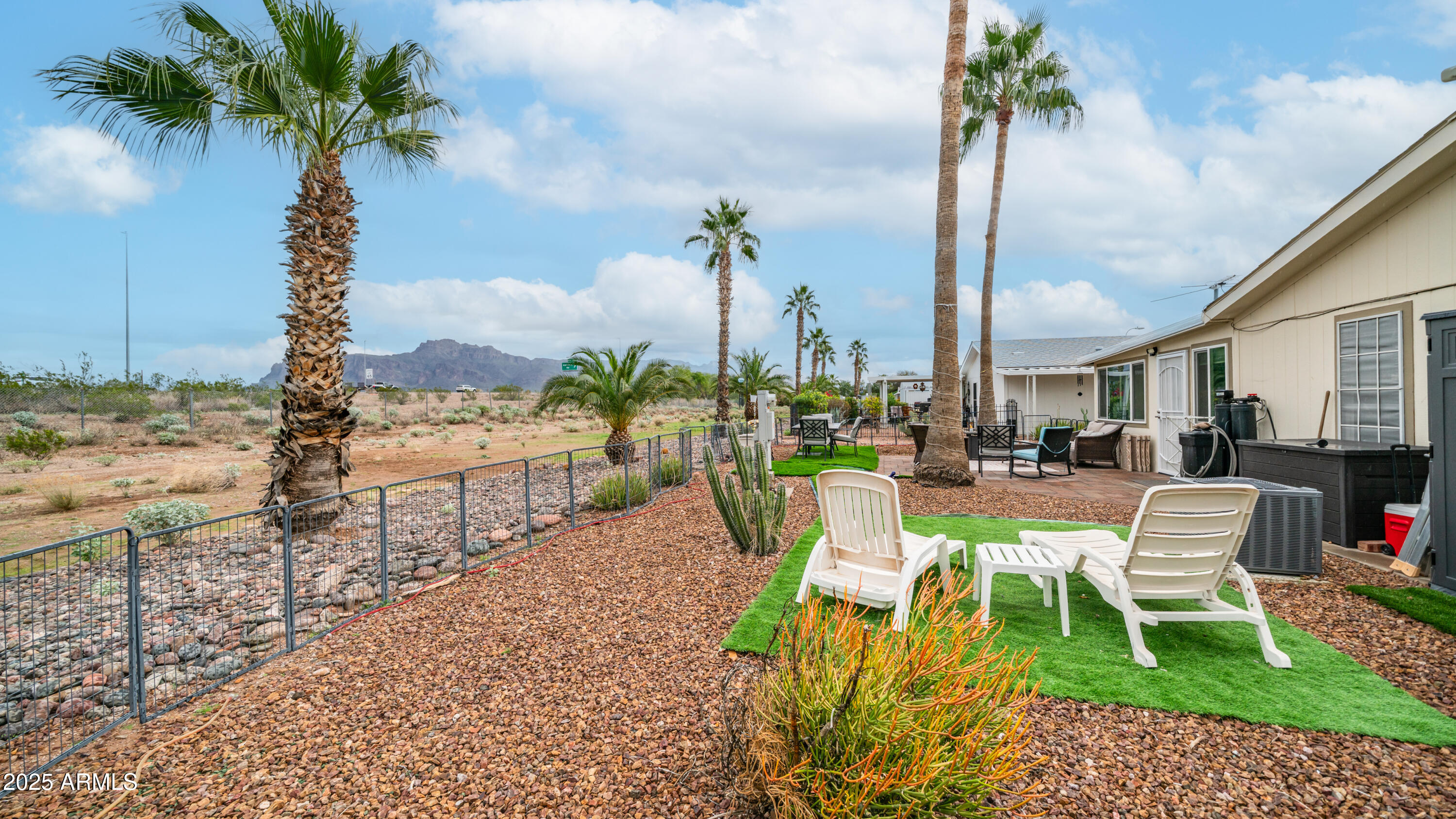 3355 South Cortez Road, Unit 98 Apache Junction, AZ 85119 - Photo 44 of 46 a view of a chairs and table in patio