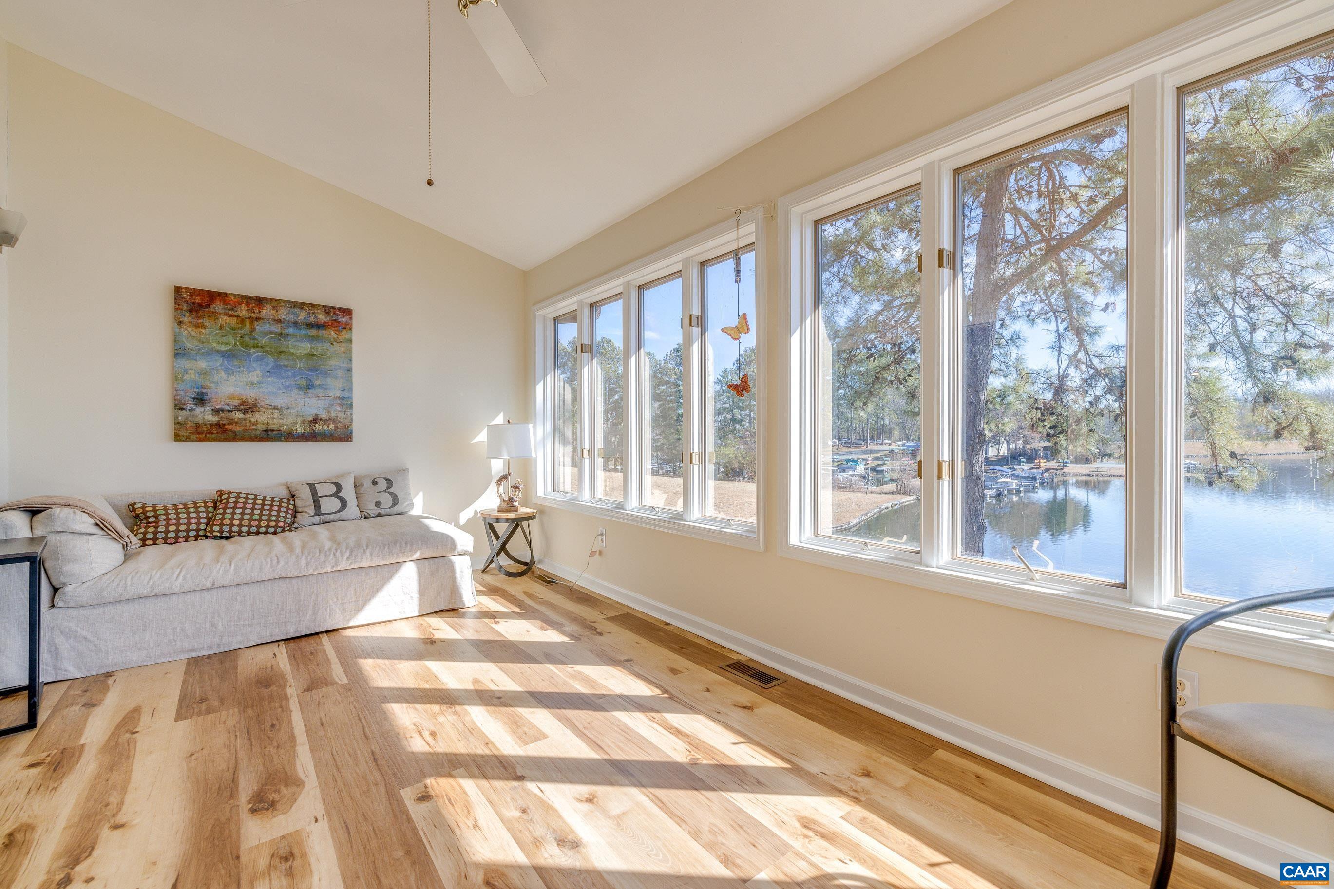 B3 Marina Point Palmyra, VA 22963 - Photo 15 of 47 a living room with furniture and a large window