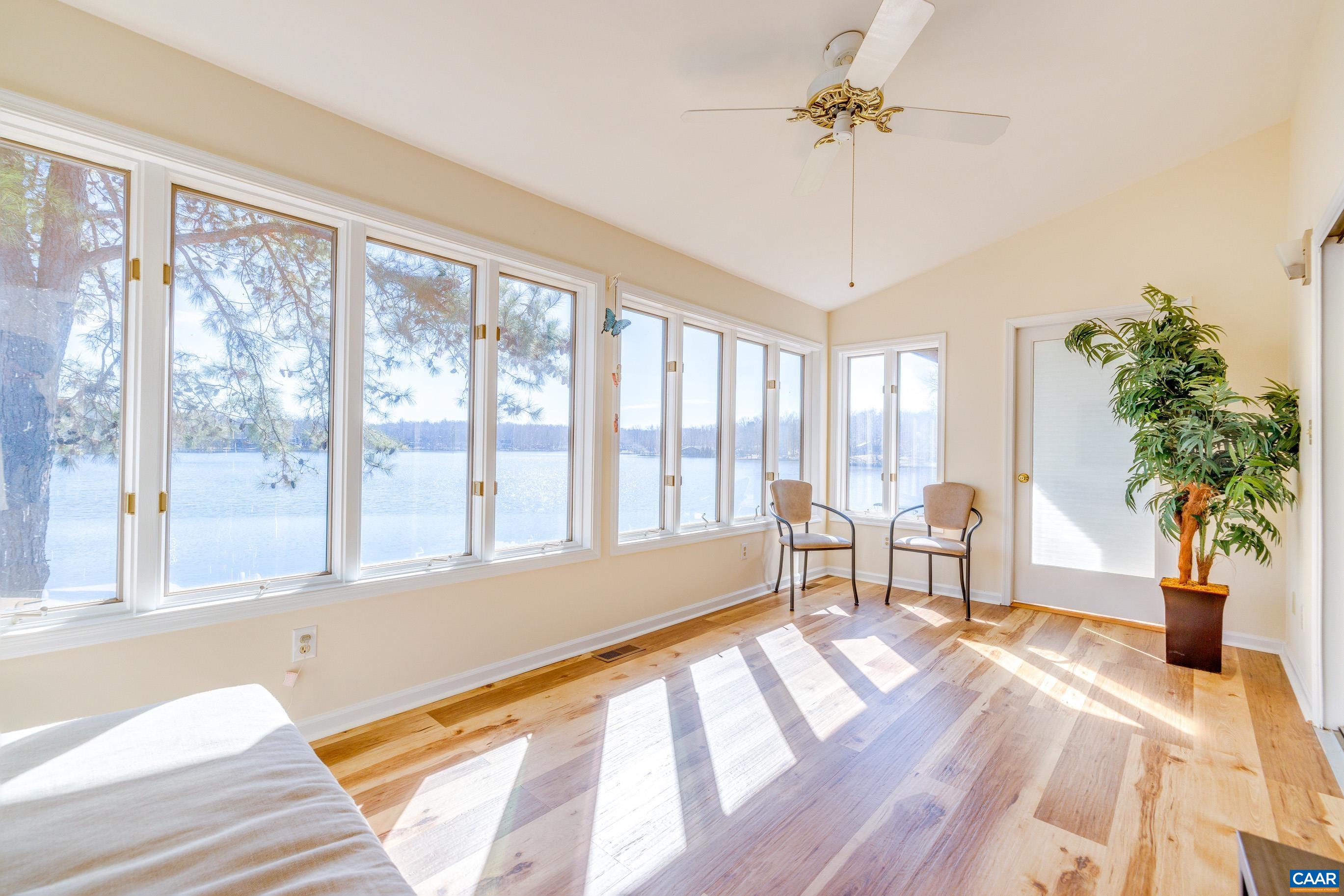 B3 Marina Point Palmyra, VA 22963 - Photo 16 of 47 a spacious bedroom with a large bed and a large window