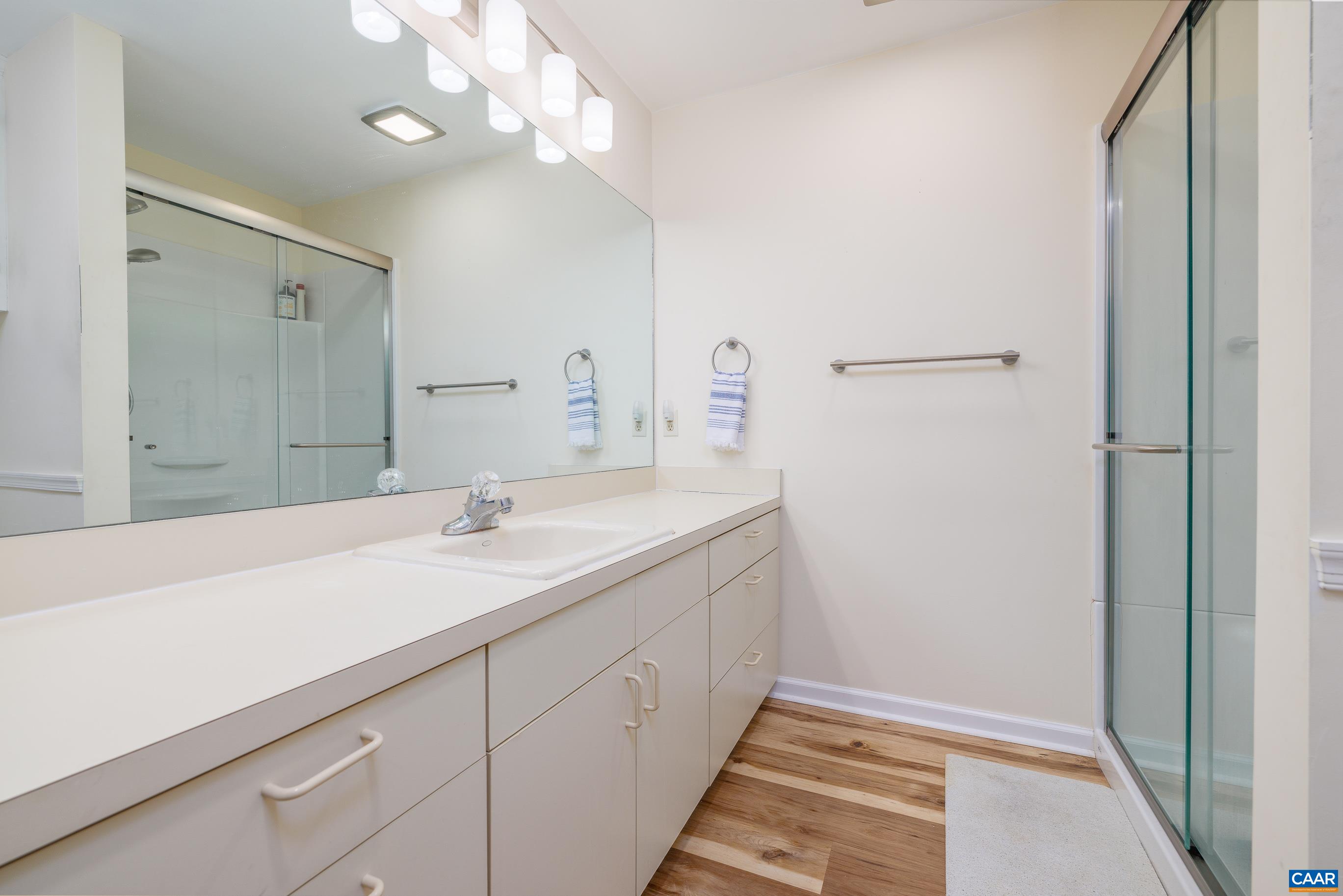 B3 Marina Point Palmyra, VA 22963 - Photo 20 of 47 a bathroom with a sink and a mirror