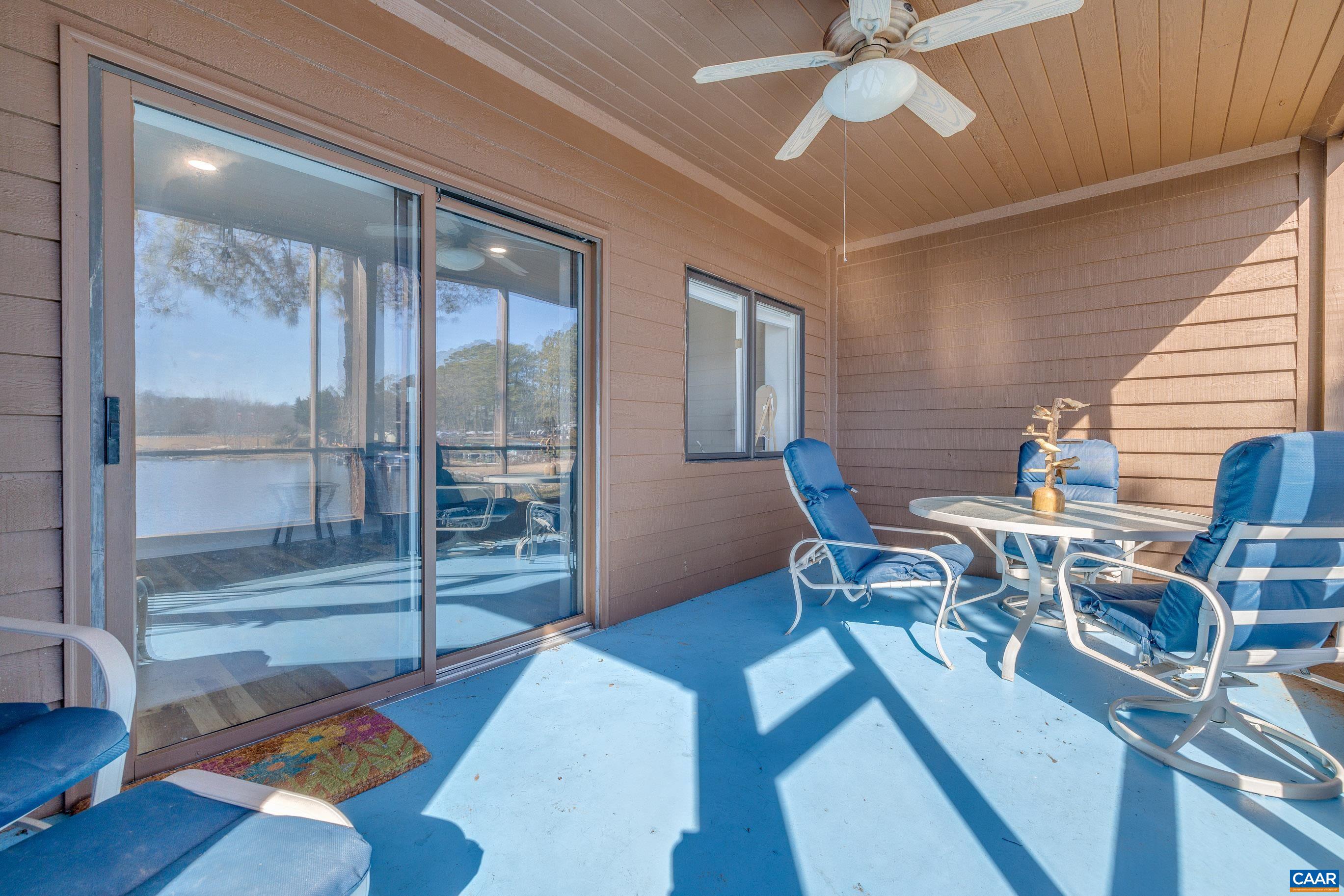 B3 Marina Point Palmyra, VA 22963 - Photo 30 of 47 a view of a livingroom with furniture and wooden floor