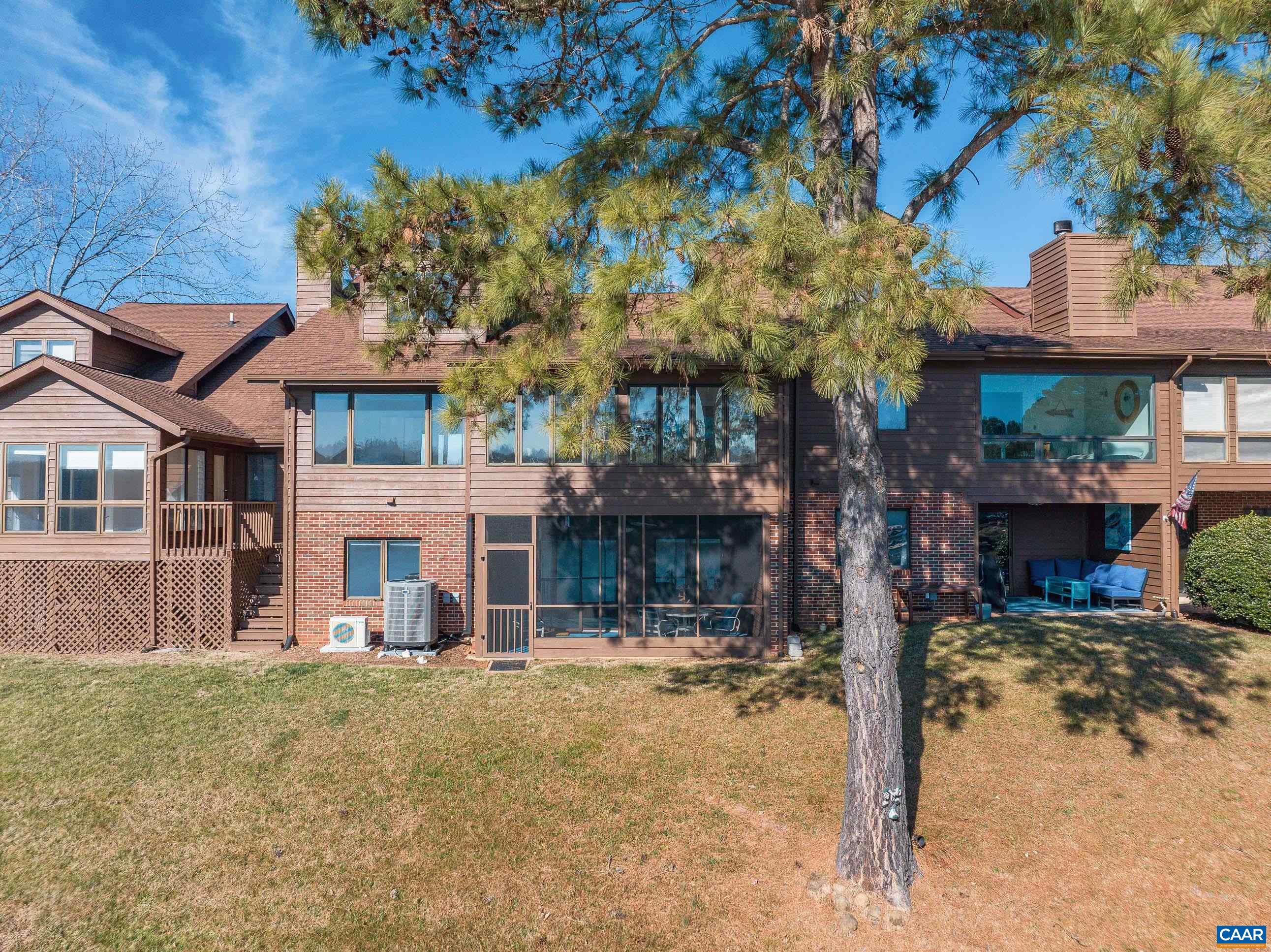 B3 Marina Point Palmyra, VA 22963 - Photo 43 of 47 a front view of a house with a yard