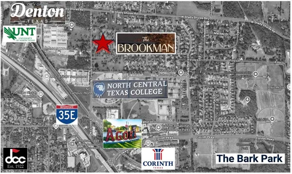 a street sign on a brick wall