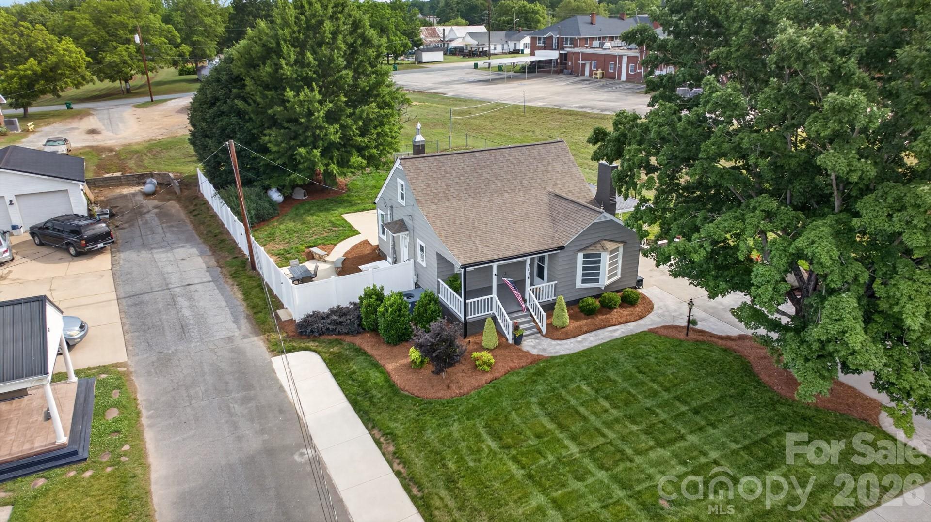 1016 Raney Street Salisbury, NC 28146 - Photo 32 of 45 an aerial view of a house with swimming pool garden and patio