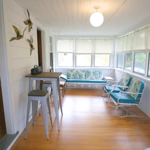 a spacious bedroom with a bed and window