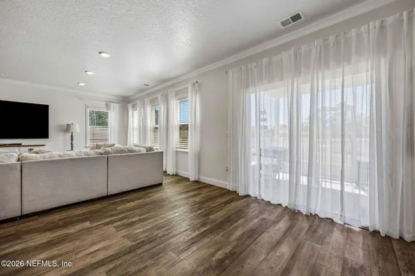 a bathroom with double vanity sinks a vanity and a mirror