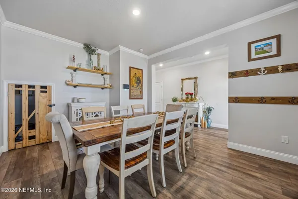 a bedroom with furniture and flat screen tv