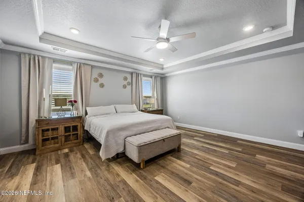 a view of a room with gym equipment and a window