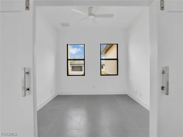 an empty room with windows