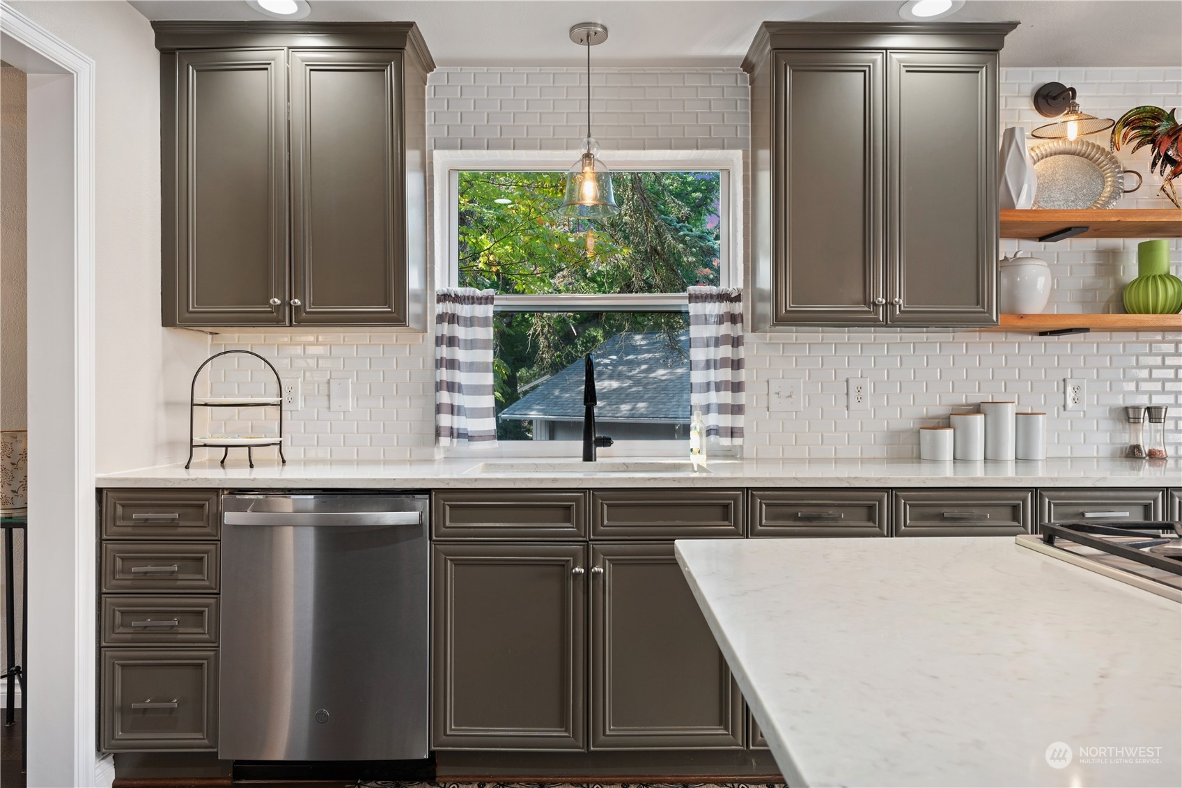2900 Kennewick Place Northeast Renton, WA 98056 - Photo 11 of 40 a kitchen with a sink and cabinets