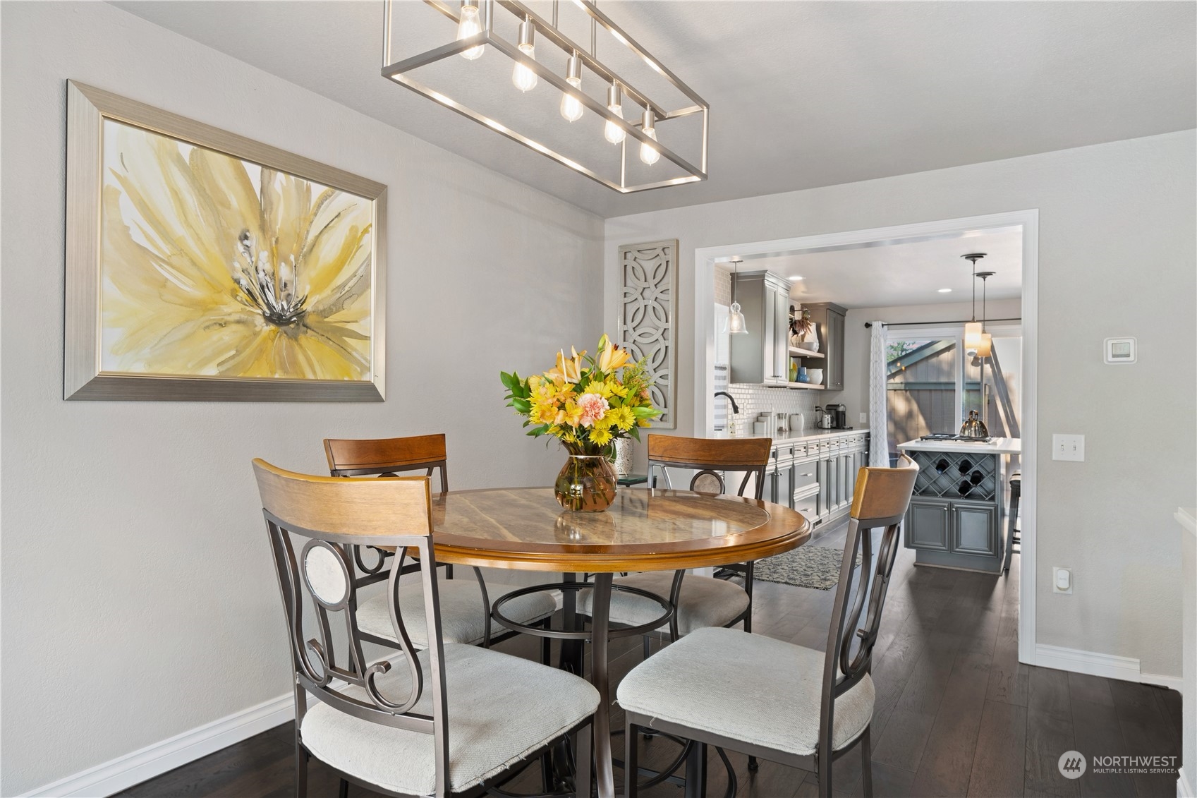 2900 Kennewick Place Northeast Renton, WA 98056 - Photo 14 of 40 a view of a dining room with furniture and wooden floor