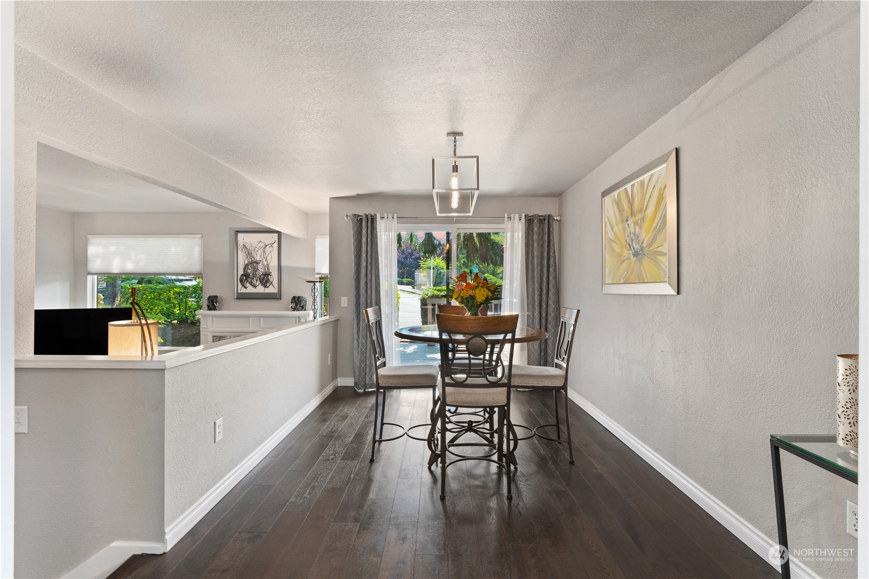 2900 Kennewick Place Northeast Renton, WA 98056 - Photo 15 of 40 a view of a dining room with furniture window and wooden floor