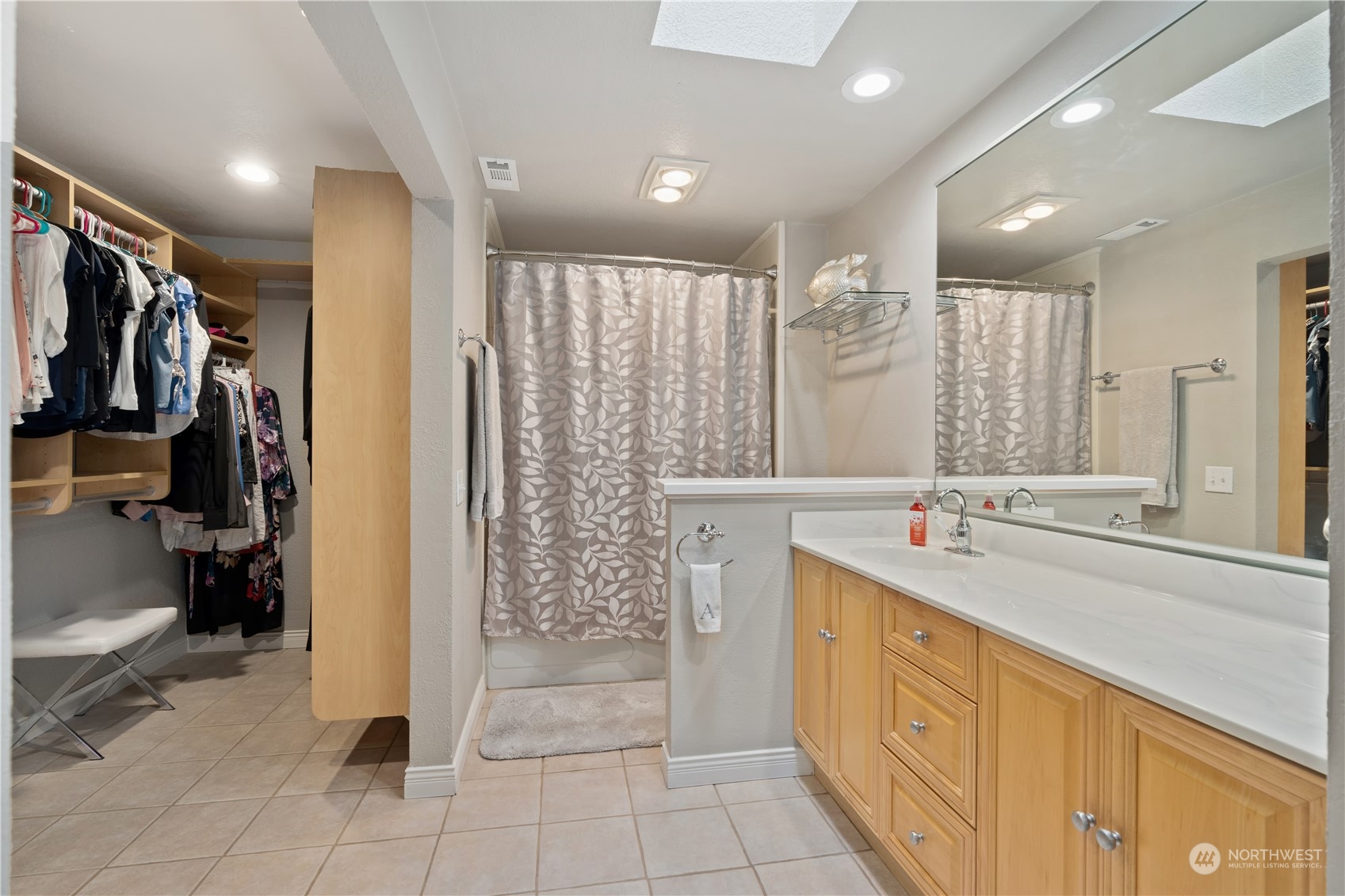 2900 Kennewick Place Northeast Renton, WA 98056 - Photo 24 of 40 a bathroom with a double vanity sink mirror and shower
