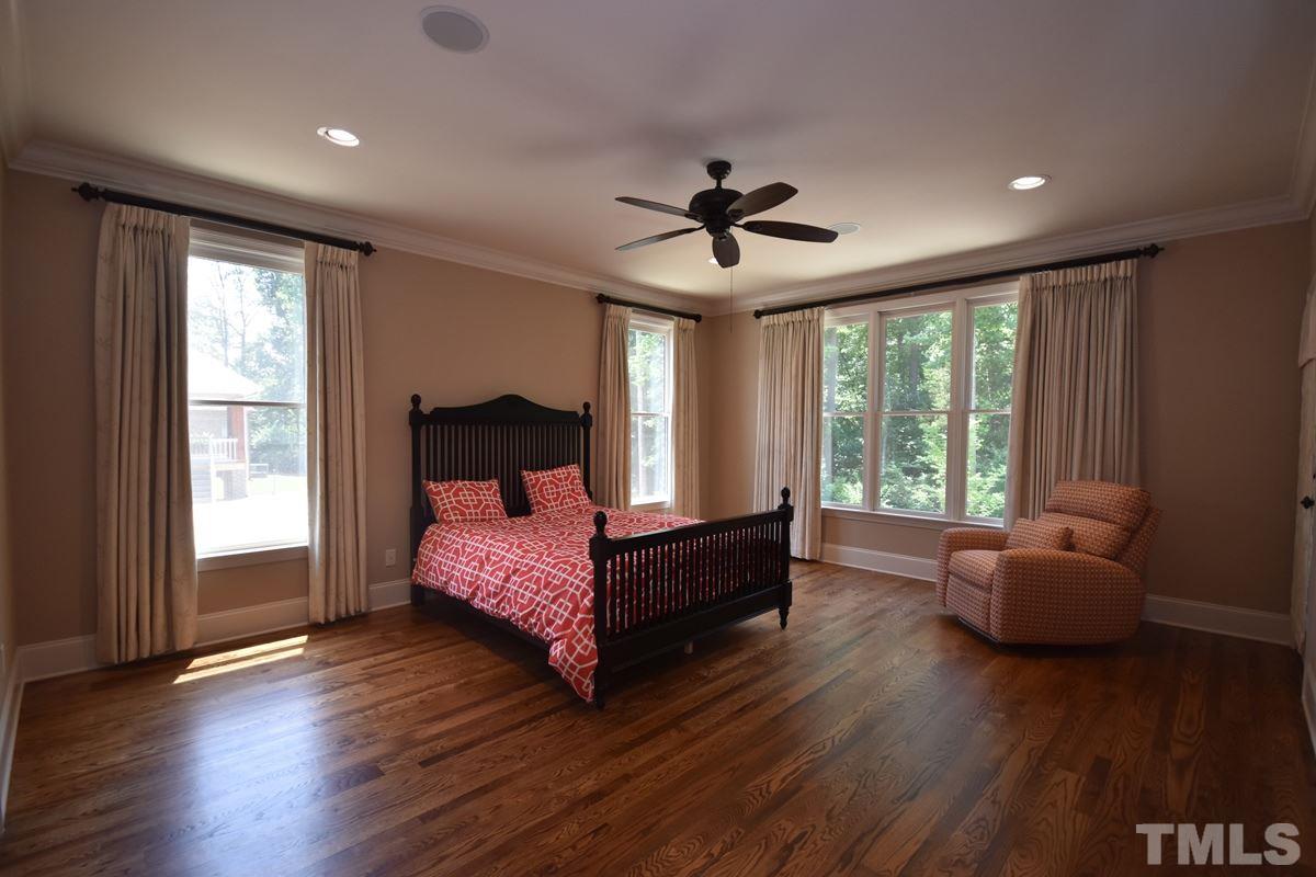 4012 Limerick Road Burlington, NC 27215 - Photo 11 of 24 a bedroom with furniture and windows