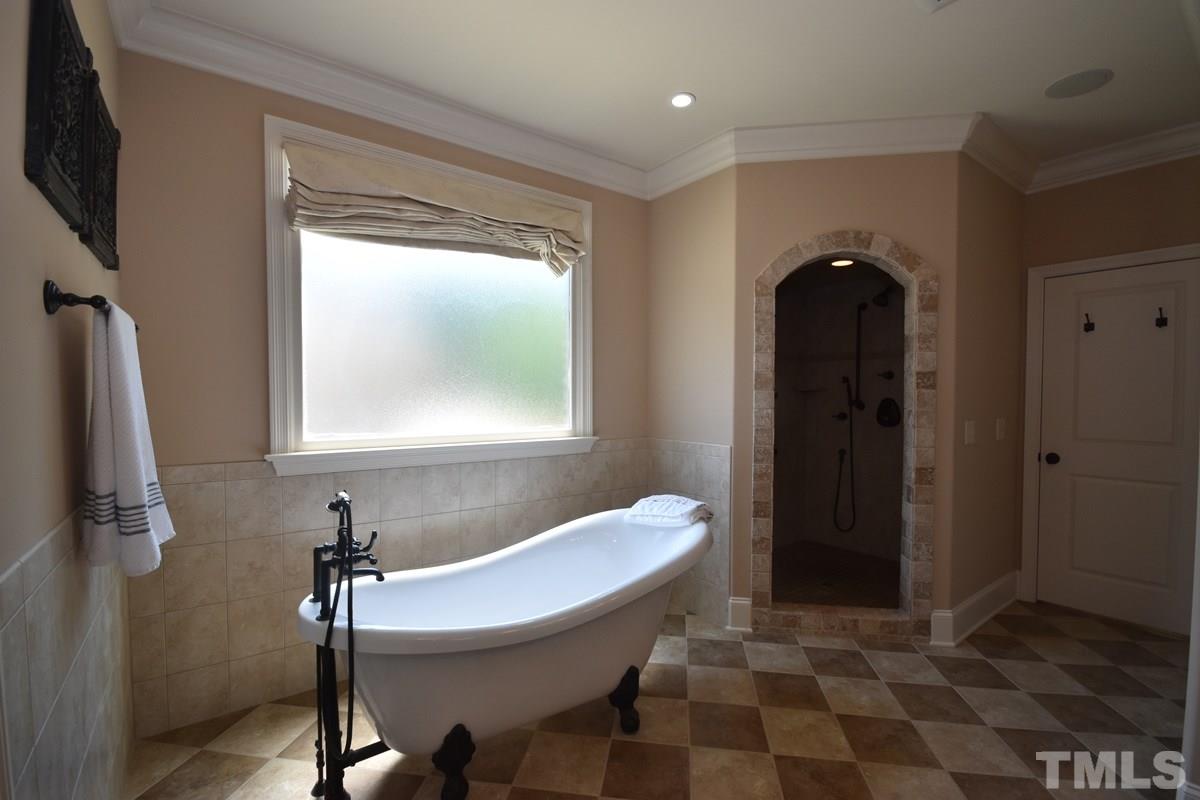 4012 Limerick Road Burlington, NC 27215 - Photo 13 of 24 a bathroom with a sink and a mirror