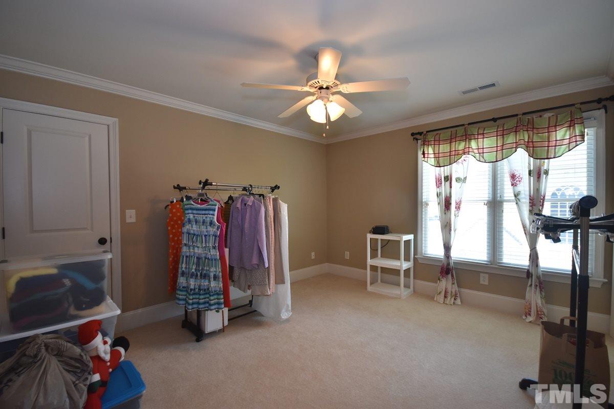 4012 Limerick Road Burlington, NC 27215 - Photo 14 of 24 a view of a room with gym equipment and a large window