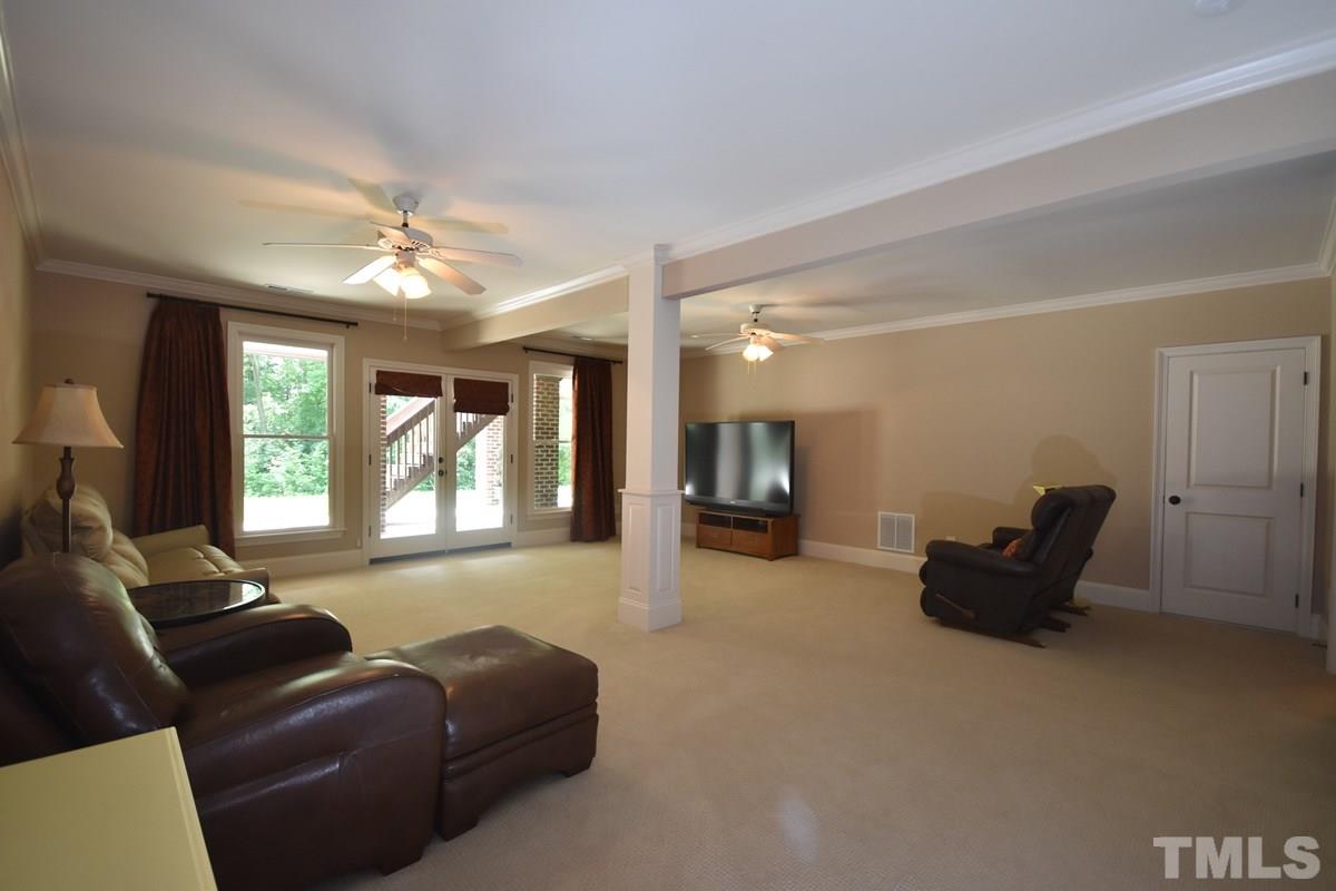 4012 Limerick Road Burlington, NC 27215 - Photo 19 of 24 a living room with furniture and a large window