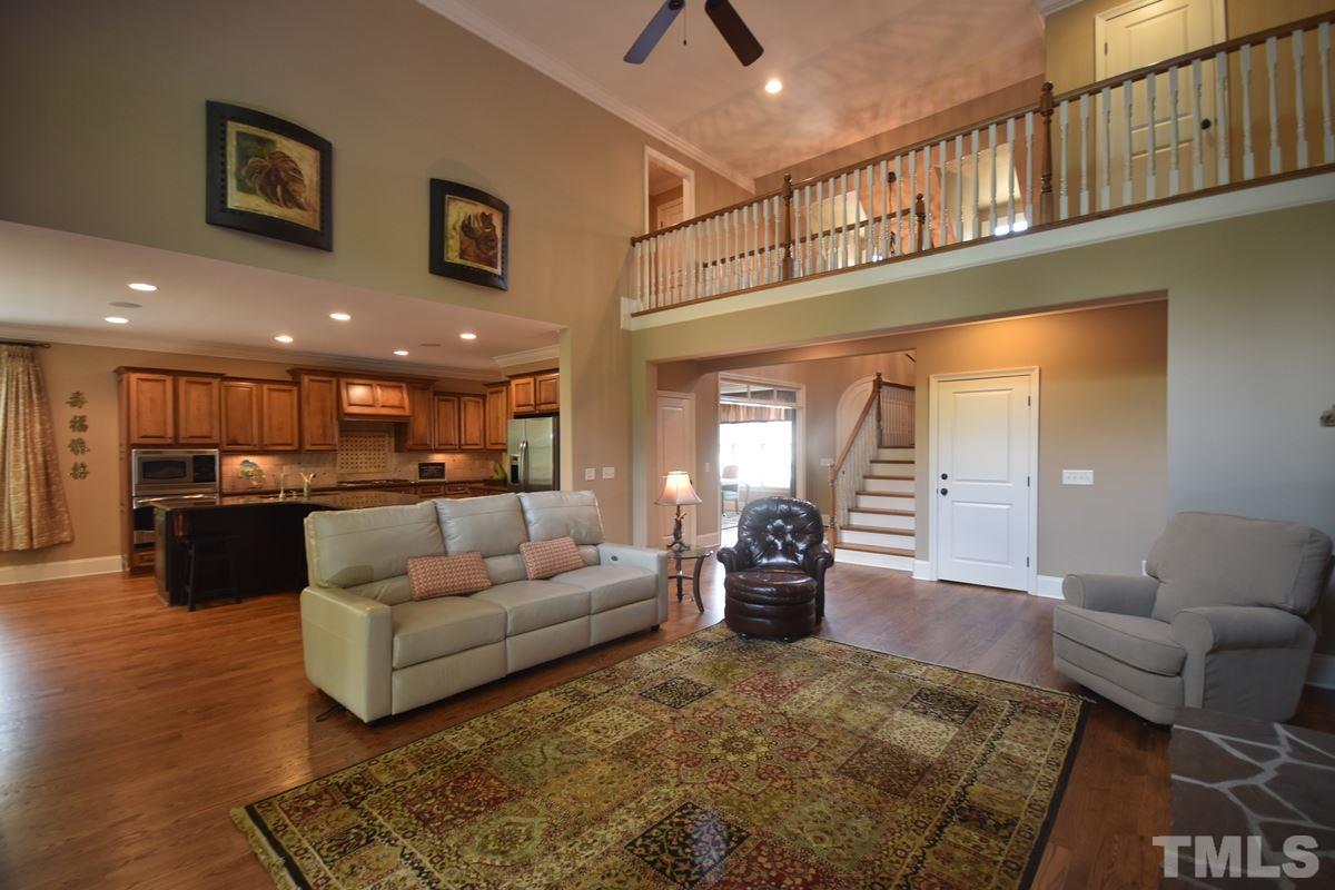4012 Limerick Road Burlington, NC 27215 - Photo 7 of 24 a living room with furniture and kitchen view