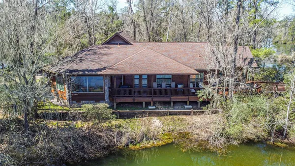a house with trees in front of it
