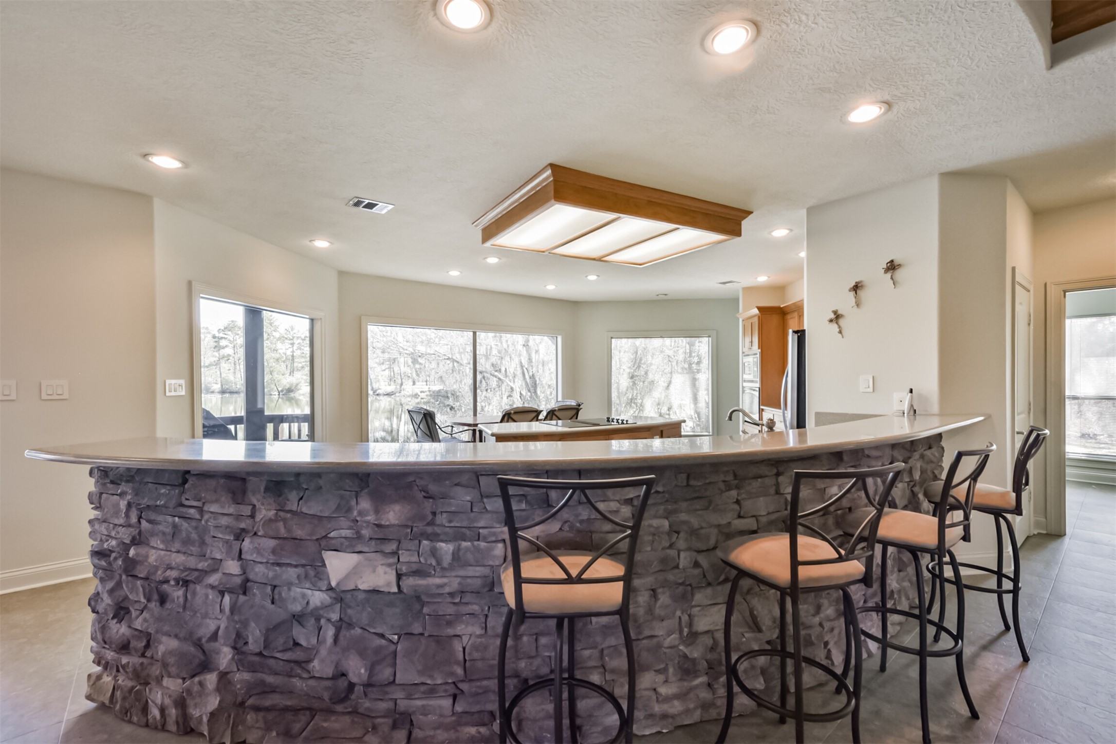 10 Raccoon Ramble Cleveland, TX 77327 - Photo 20 of 49 a kitchen with a table and chairs in it