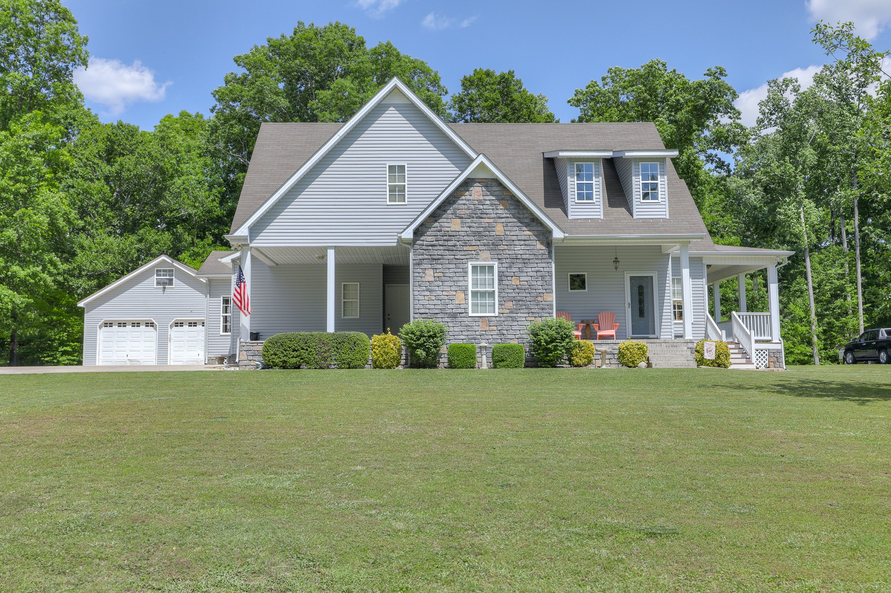 4630 Mt View Road Manchester, TN 37355 - Photo 1 of 25 a front view of a house with a garden