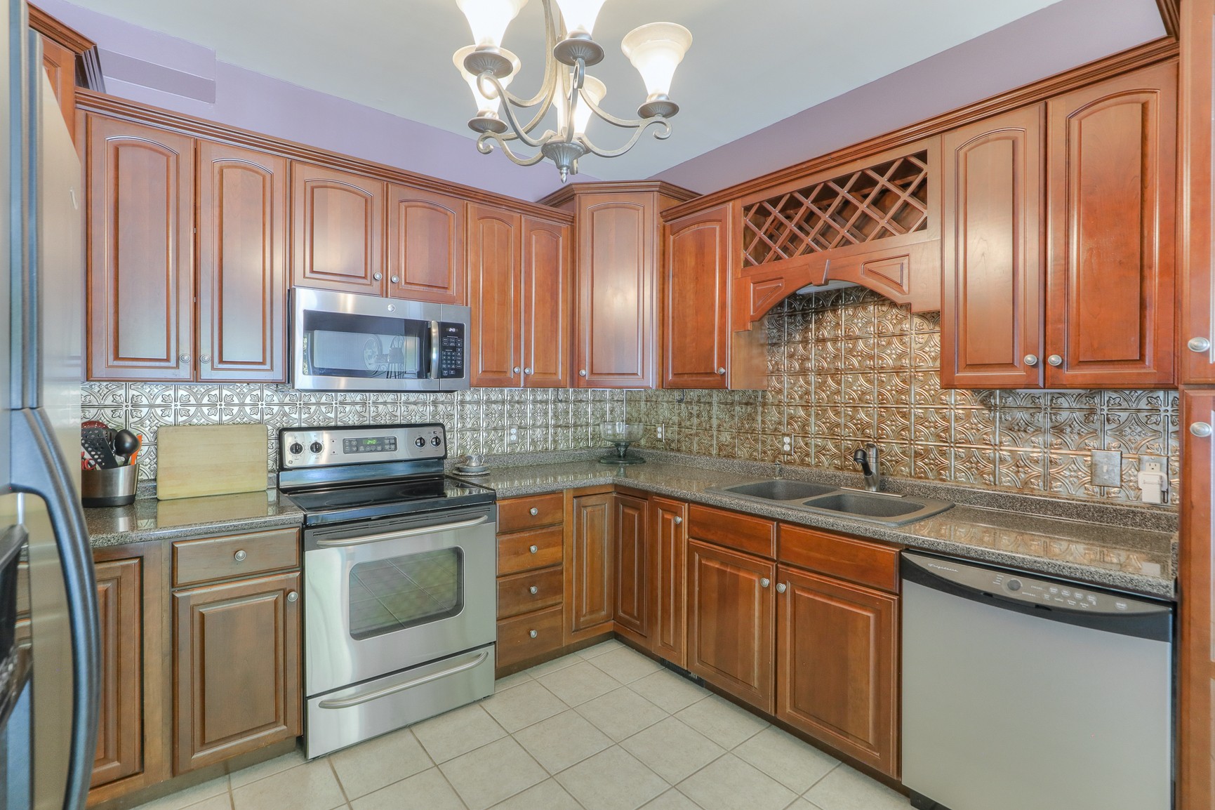 4630 Mt View Road Manchester, TN 37355 - Photo 17 of 25 a kitchen with stainless steel appliances granite countertop a sink and cabinets