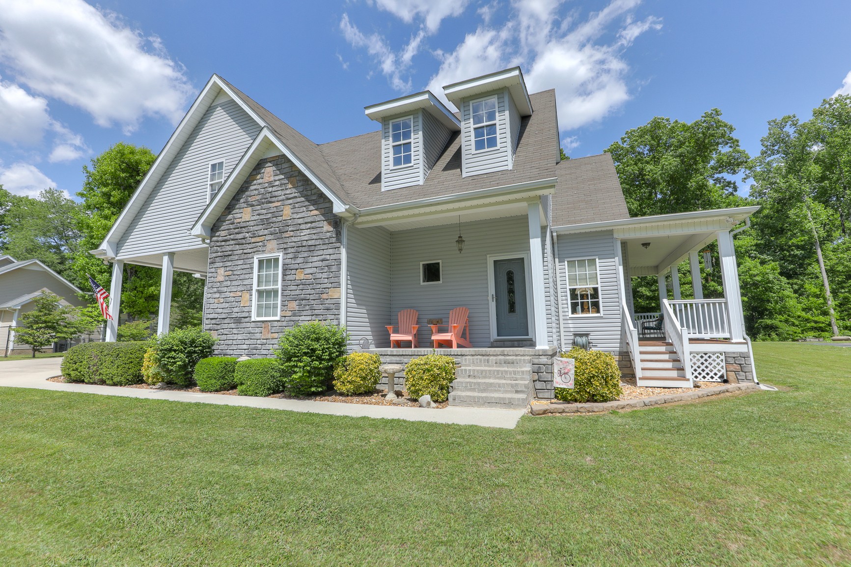 4630 Mt View Road Manchester, TN 37355 - Photo 3 of 25 a front view of a house with a yard table and chairs