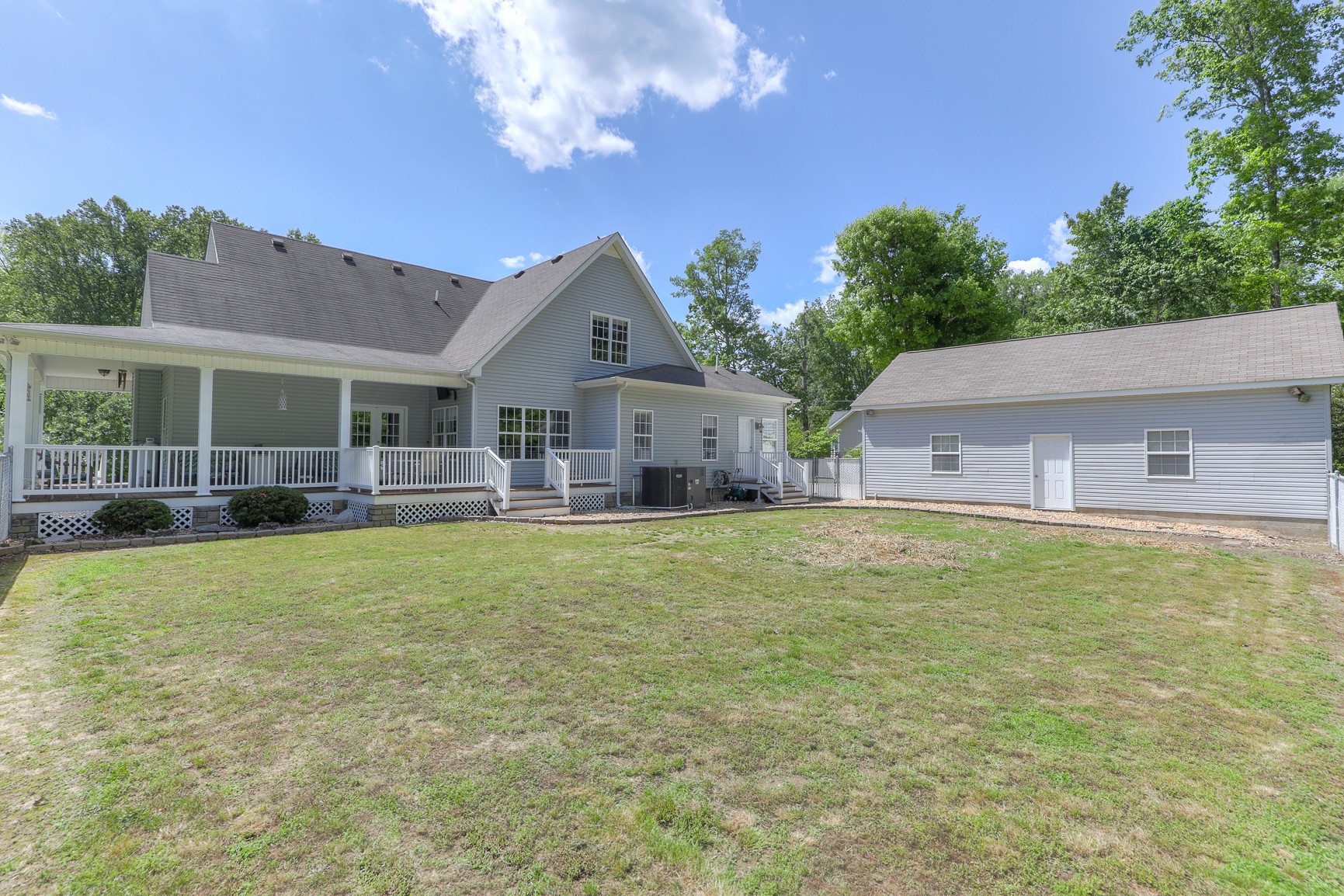 4630 Mt View Road Manchester, TN 37355 - Photo 6 of 25 a front view of house with yard and trees in the background