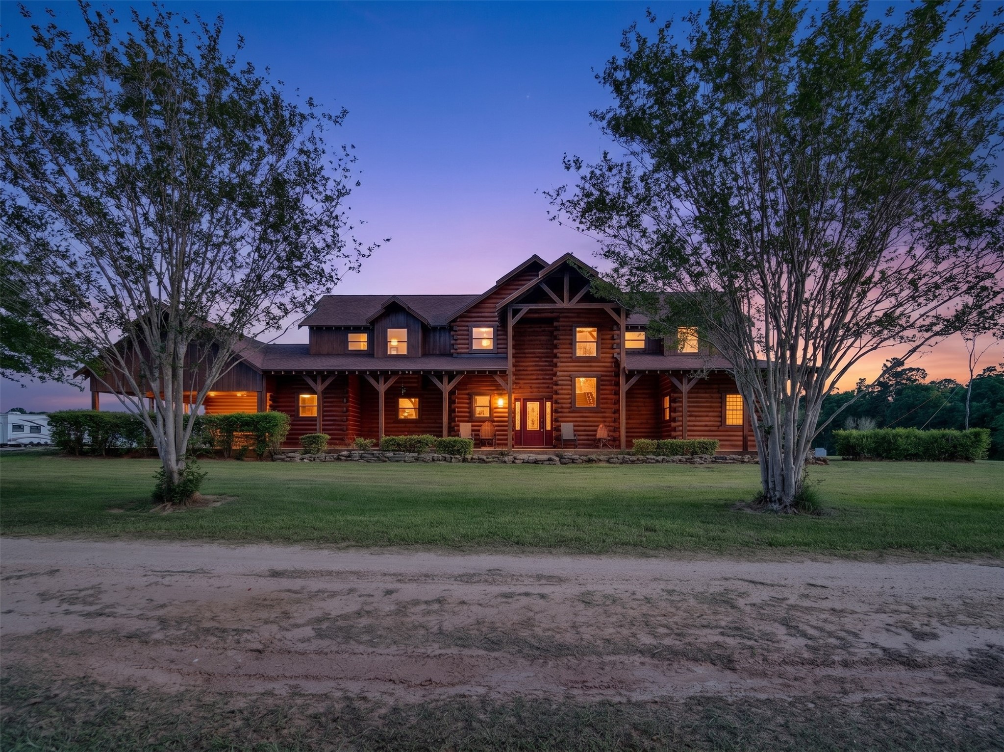 325 Forest Service 217 Road Shepherd, TX 77371 - Photo 1 of 46 a view of a big house with a big yard and large trees