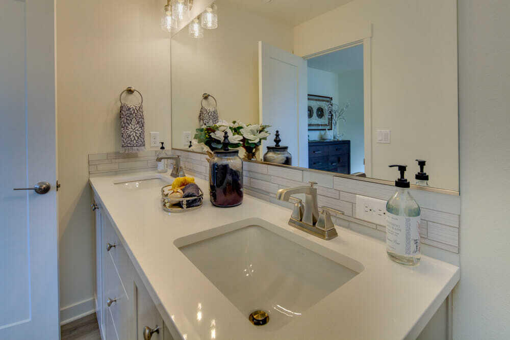 4636 Southwest 37th Street Redmond, OR 97756 - Photo 29 of 49 Sample photo, specs vary. Primary bath with dual, undermount vanity of quartz