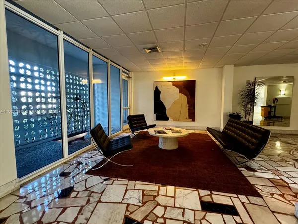 a living room with a couch and a table