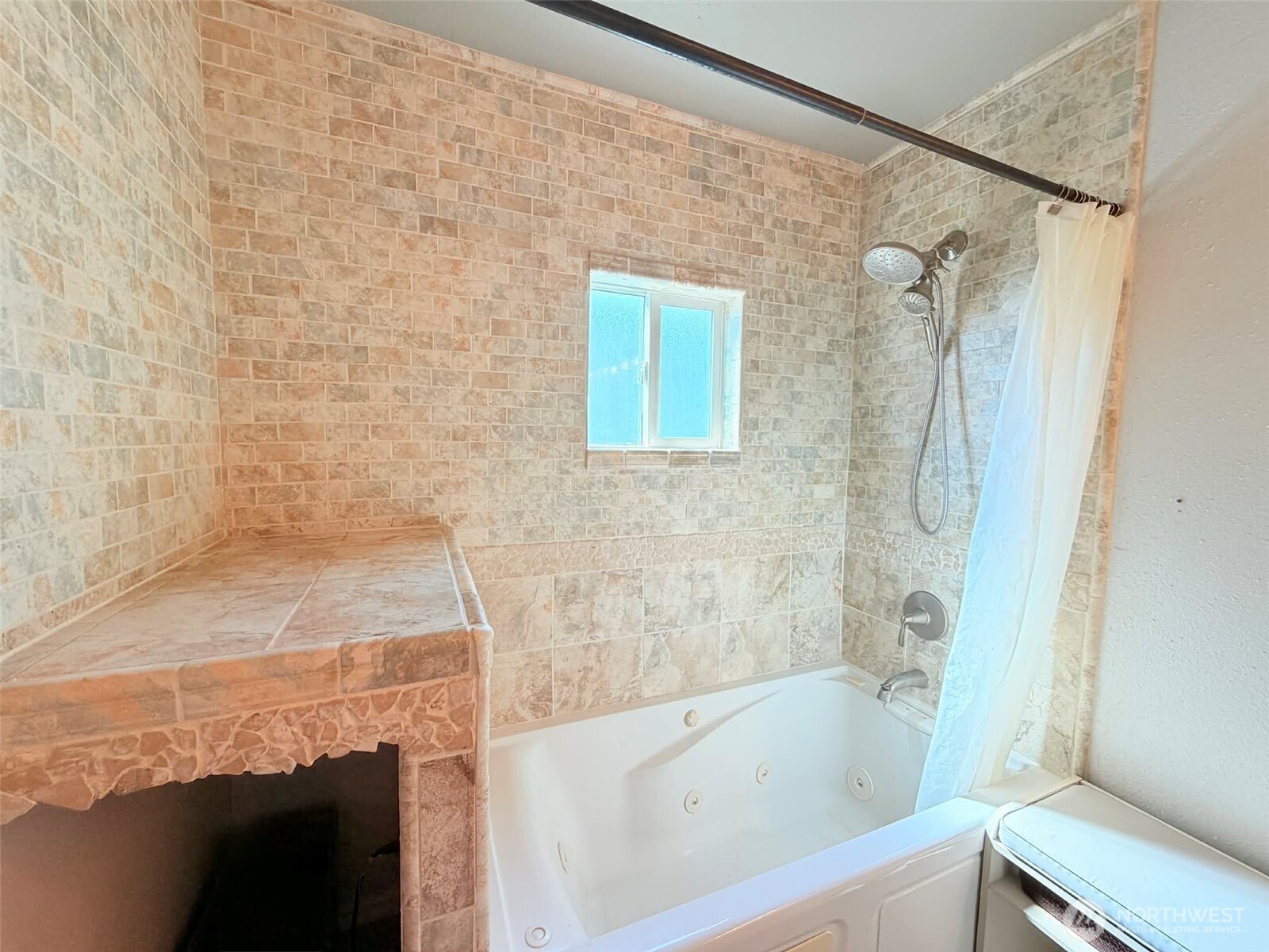 2006 West Second Street Aberdeen, WA 98520 - Photo 27 of 39 a bathroom with a bathtub and shower