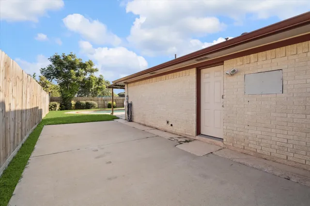 a backyard of a house with lots of green space