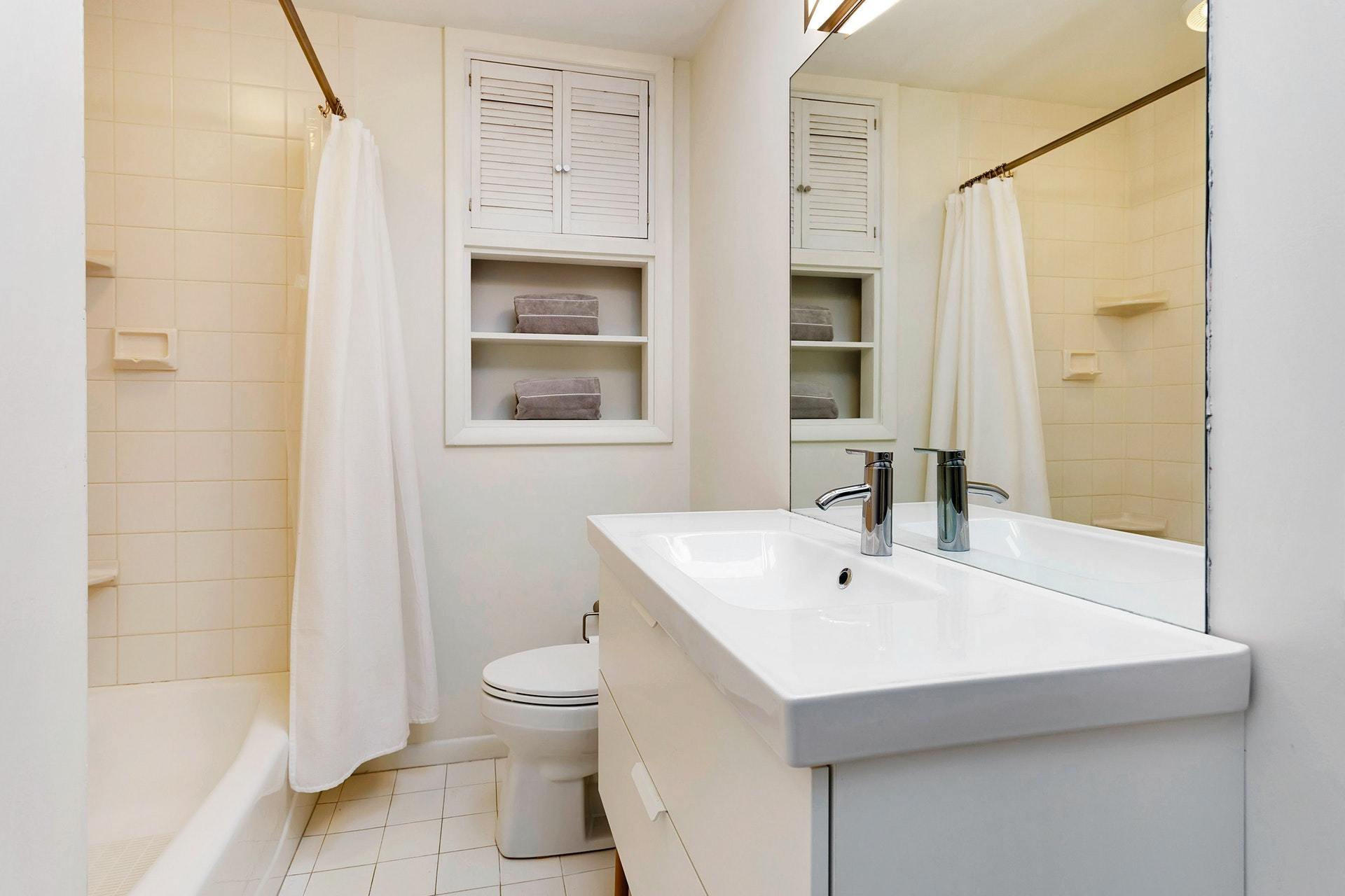 21 Princes Pine Road Norwalk, CT 06850 - Photo 26 of 27 a bathroom with a sink a toilet and shower