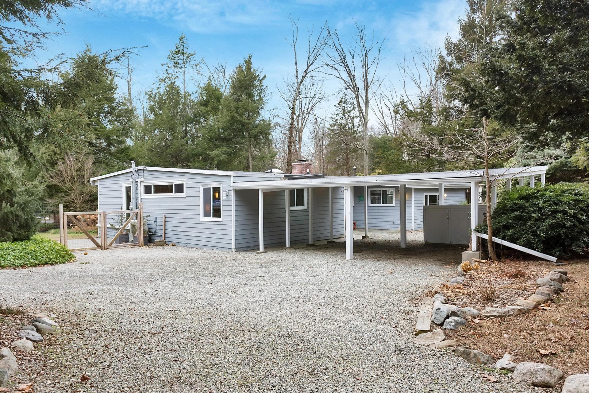 21 Princes Pine Road Norwalk, CT 06850 - Photo 3 of 27 a front view of a house with a yard