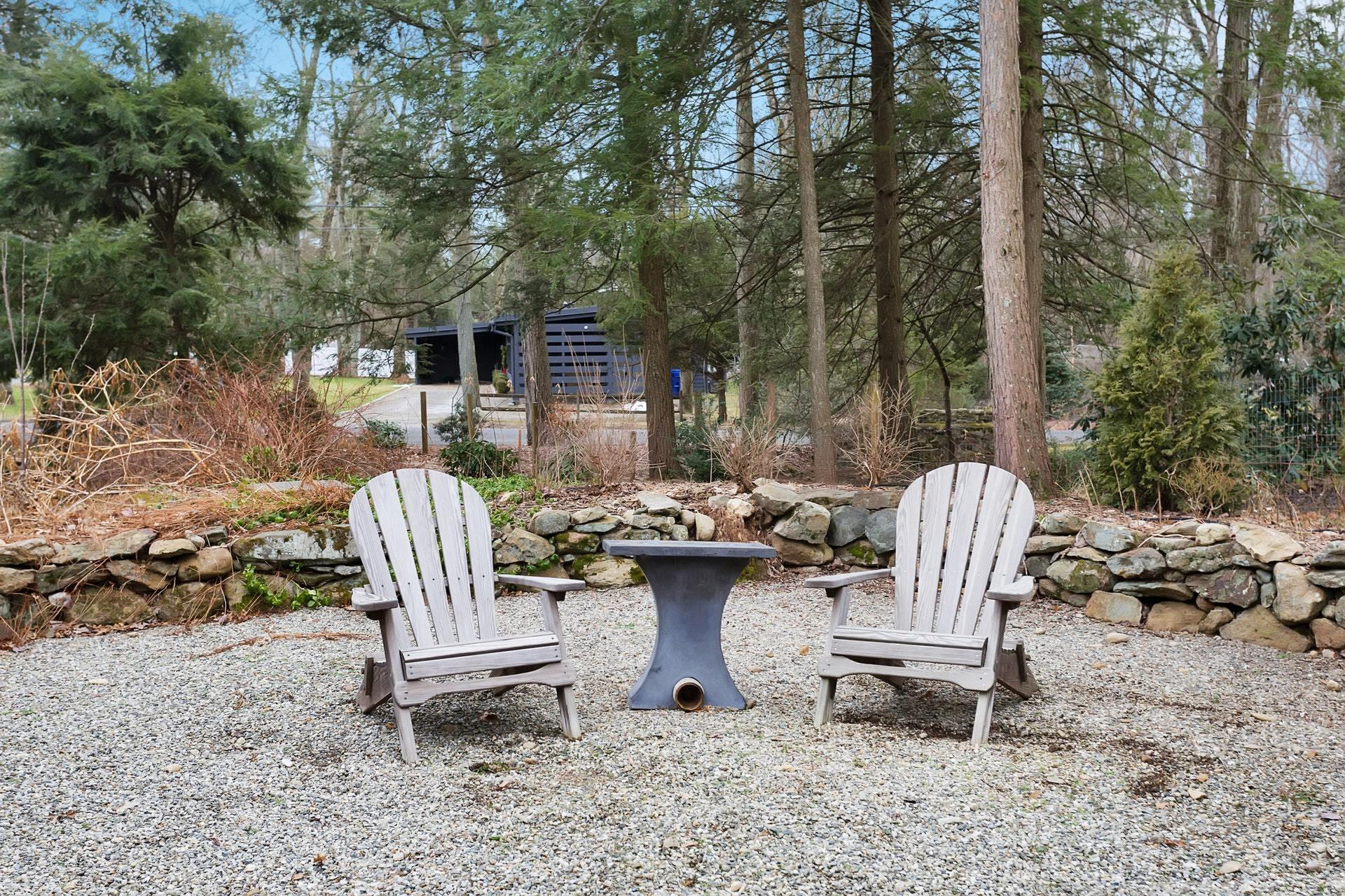 21 Princes Pine Road Norwalk, CT 06850 - Photo 8 of 27 a view of backyard with table and chairs couches with wooden fence and plants