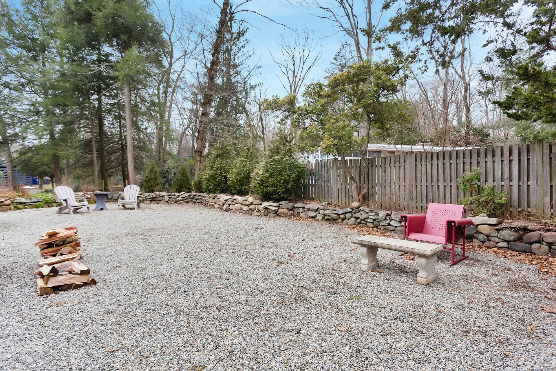 21 Princes Pine Road Norwalk, CT 06850 - Photo 9 of 27 a backyard of a house with table and chairs