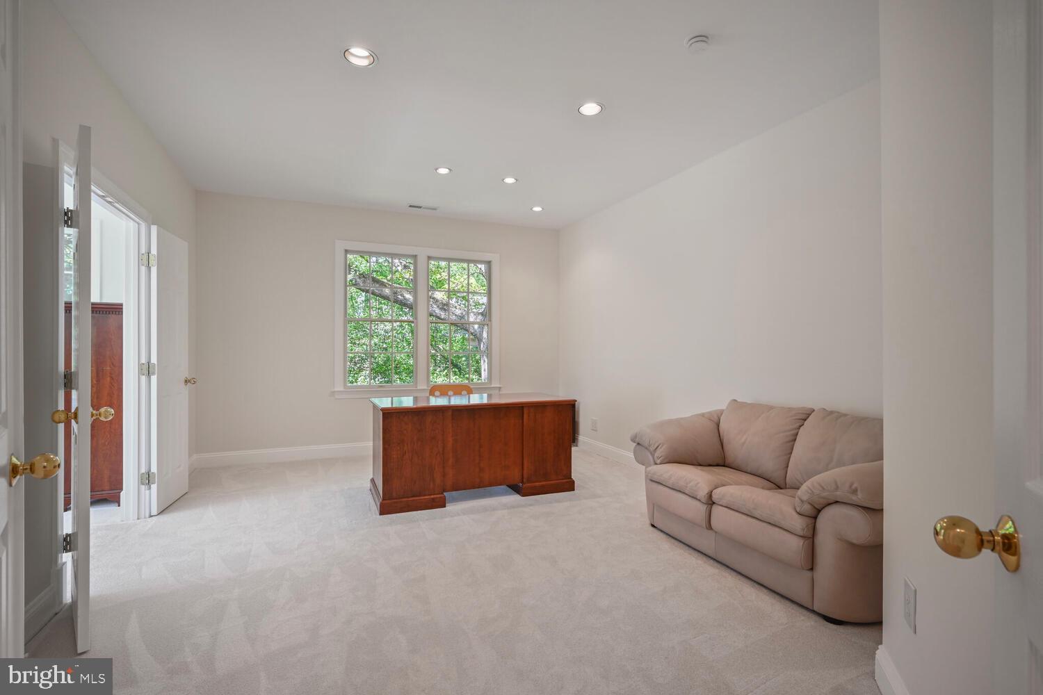 7401 Honesty Way Bethesda, MD 20817 - Photo 26 of 54 a living room with furniture and a window