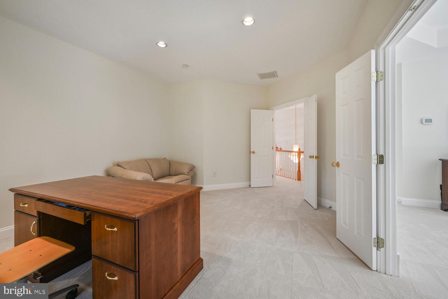7401 Honesty Way Bethesda, MD 20817 - Photo 27 of 54 a hall with a sink and a toilet