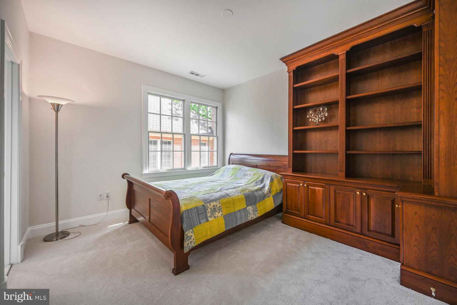 7401 Honesty Way Bethesda, MD 20817 - Photo 33 of 54 a bedroom with a bed and a window